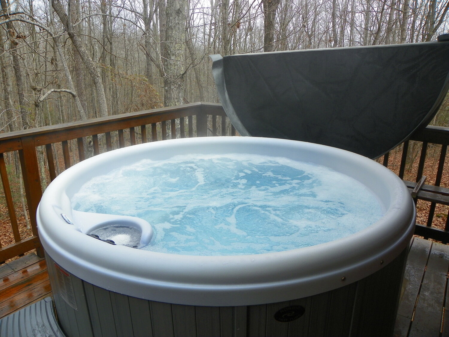 relaxing jacuzzi at Laurel Place vacation cabin rental