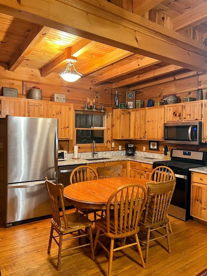  Modernly beautiful fully-stocked kitchen at Laurel Cove cabin. 