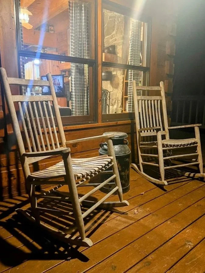  Rocking chairs on porch at night at Turkey Scratch cabin 