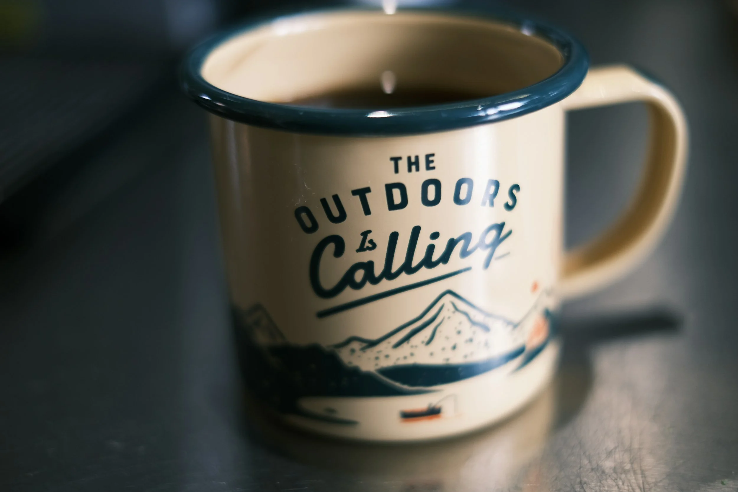 hot cup of coffee at cabin in winter