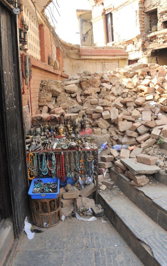 tk nepal 2016 cor kathmandu collapsed building souvenir stand.jpg