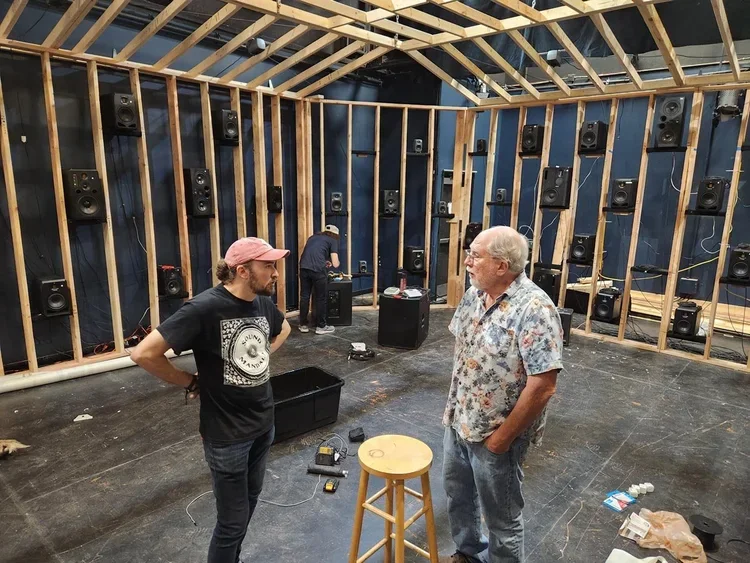 Sound Mandala under construction, showing timber framing and many individually mounted loudspeakers