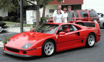The customer and his family taking delivery of the modified F40. The car was also featured in European Car Magazine.