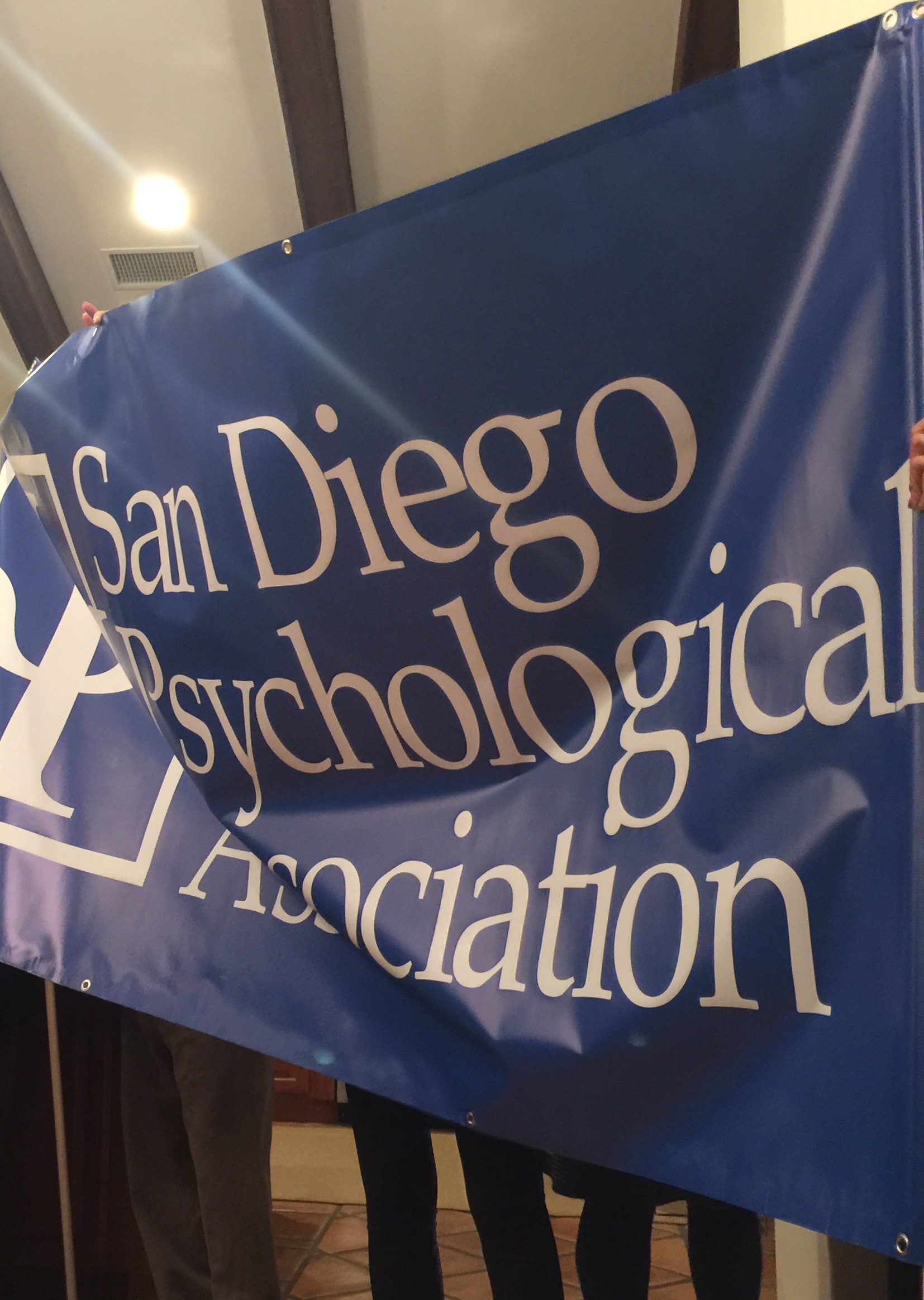 San Diego Psych Association's Banner. Held up by Board of Psych members.