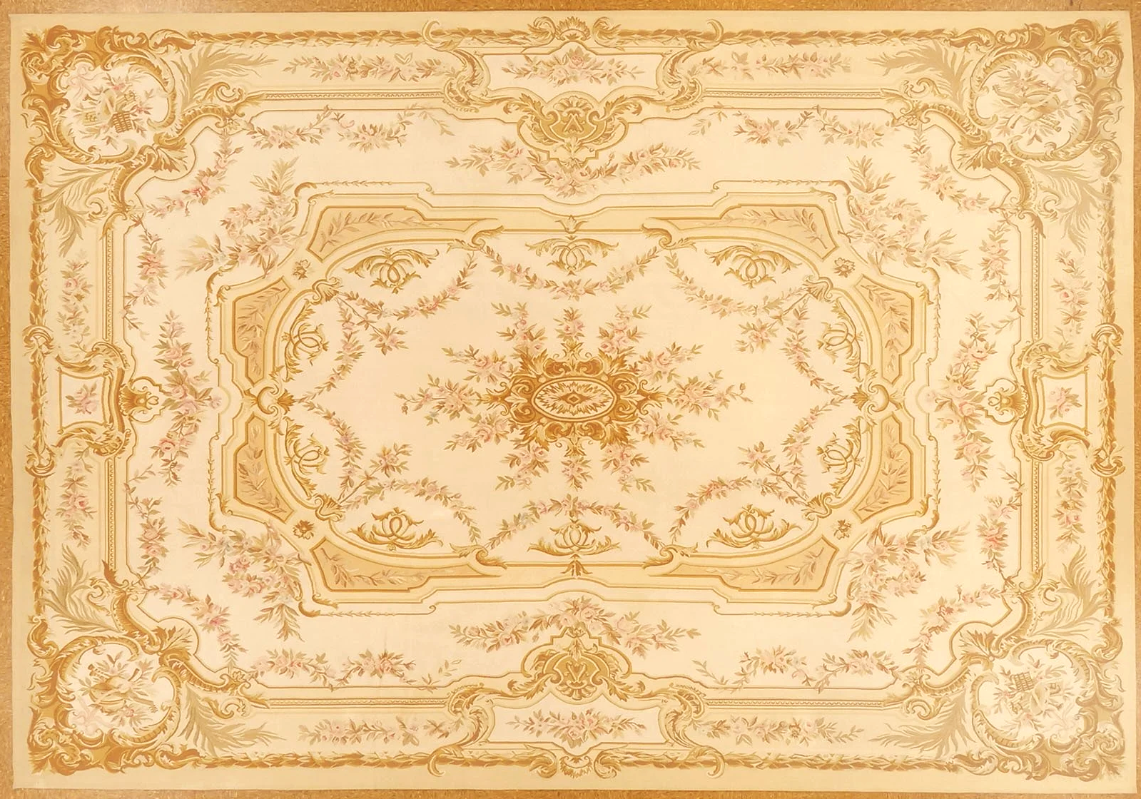 Soft gold and ivory handwoven woolen aubusson rug in size 9.11 x 14.3