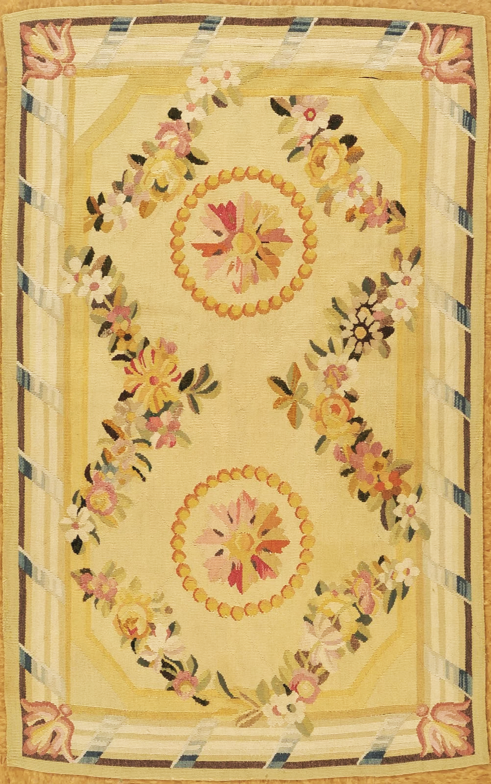 antique French aubusson carpet size in size 3.7 x 5.9 with wreath patterns in soft colors