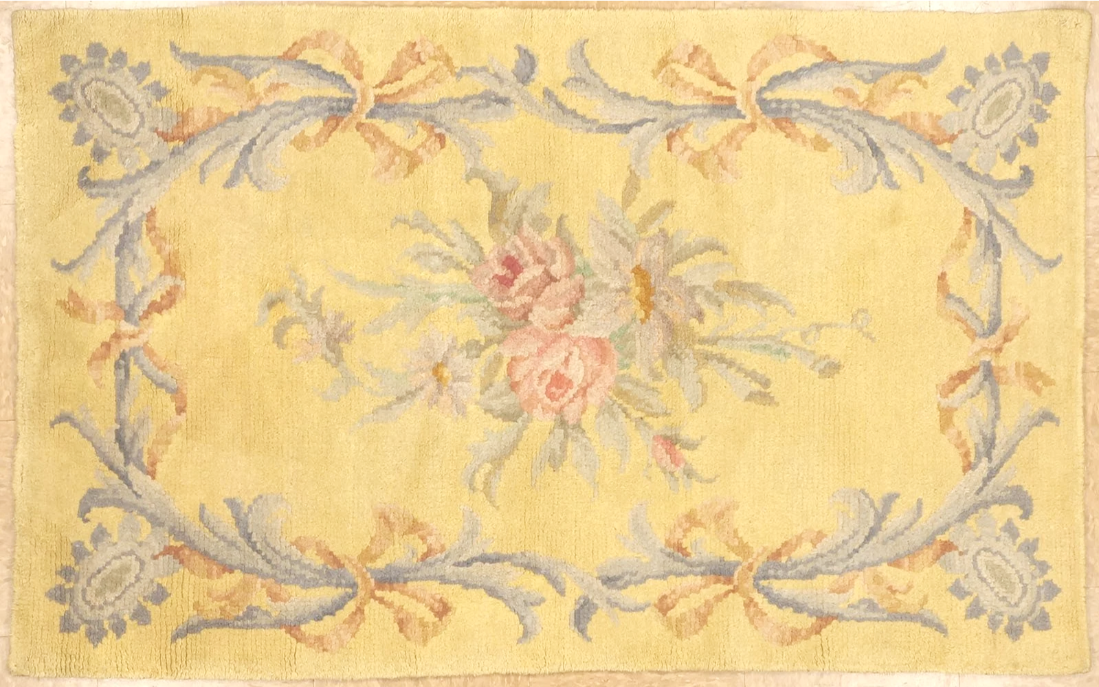 Antique savonnerie carpet, with full pile in yellow background