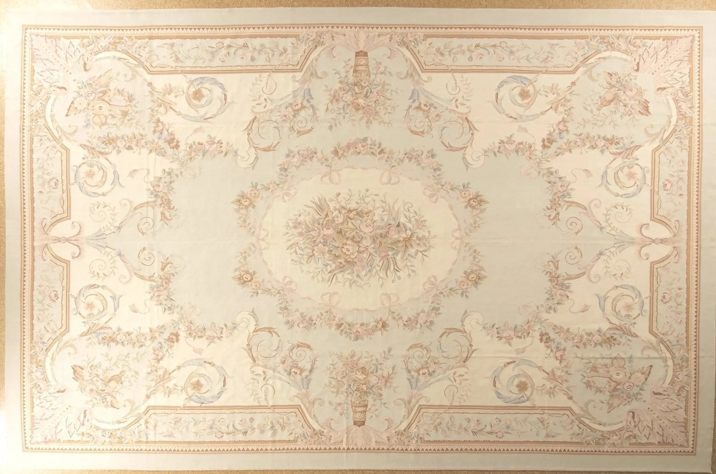 handwoven aubusson carpet in pastel colors