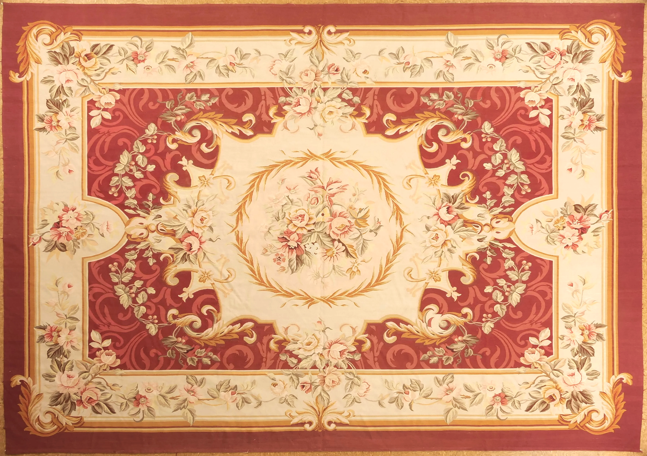 handwoven aubusson rug in reds gold and ivory, size 10 x 14.2