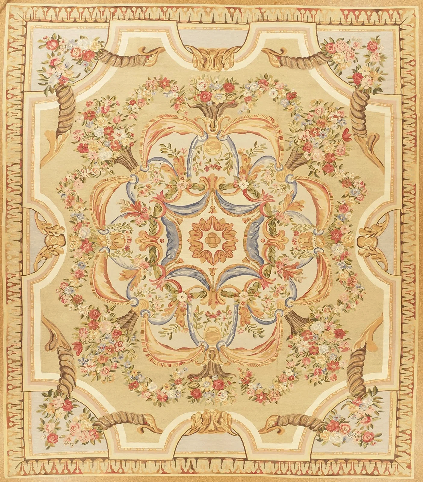 A recreation of a Louis XV Aubusson rug with a floral pattern in pastel colors, featuring intricate swirls, flowers, and borders.