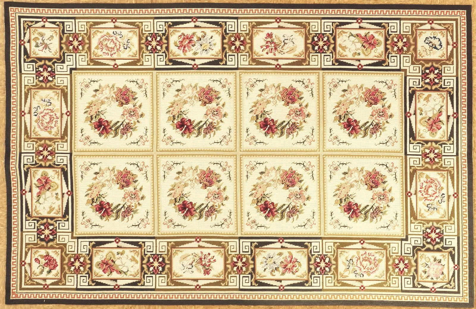 All wool hand woven 4 x 6 needlpoint rug with an all over box pattern.