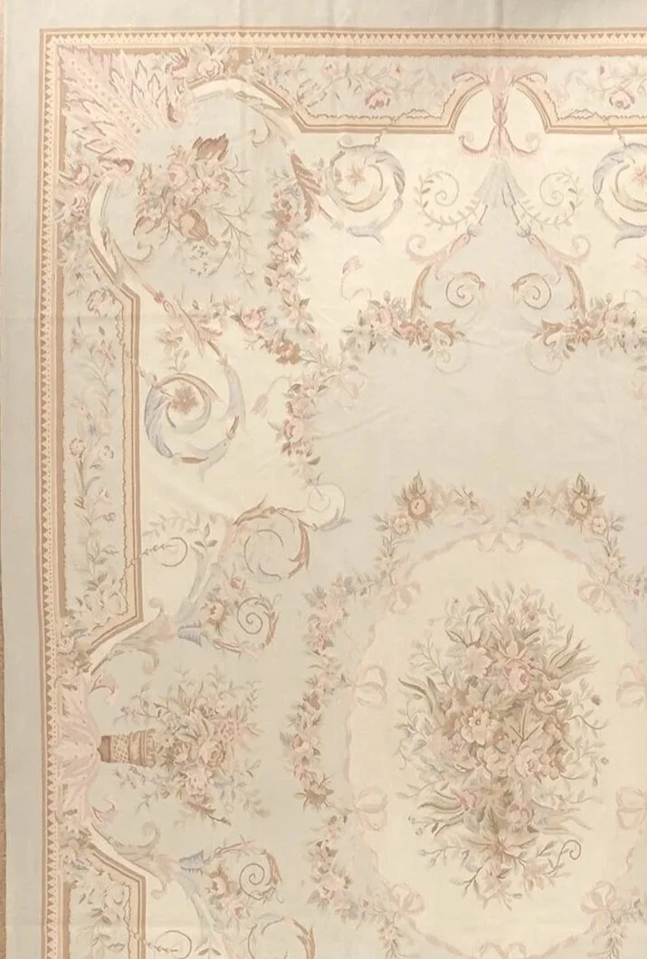 Musical Instruments and soft pastel colors define this handwoven woolen aubusson carpet