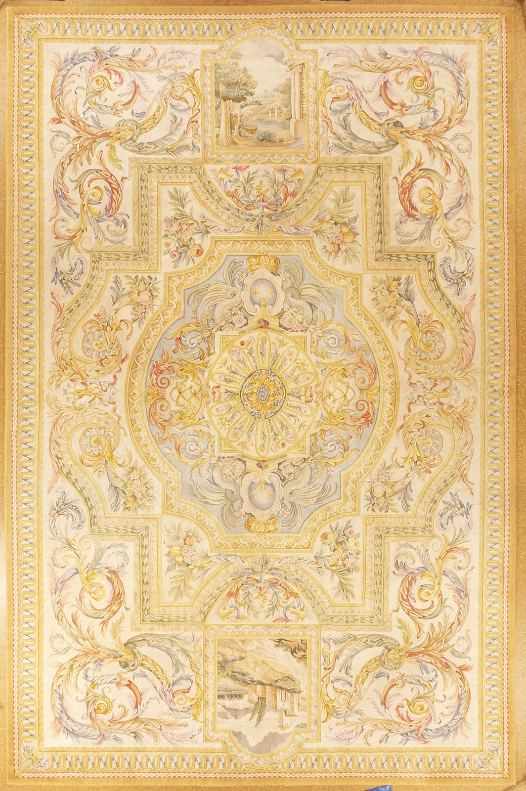 Handknotted Savonneriie Carpet Louis XIV Style with intricate floral and scroll patterns, featuring andscape scenes at the corners.