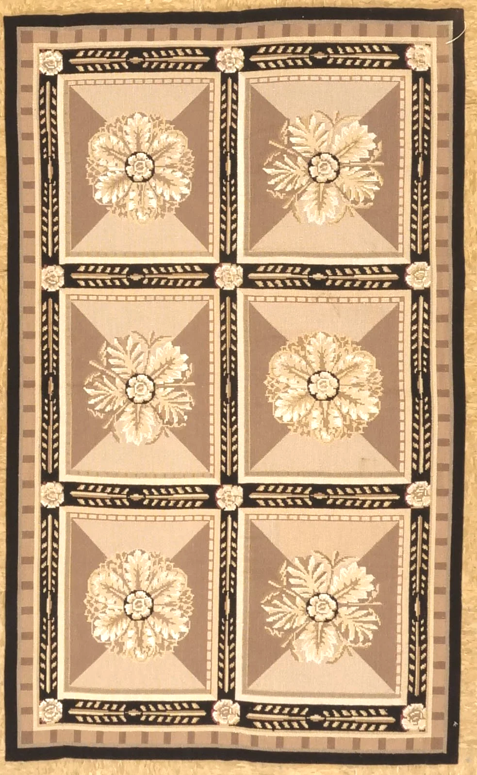 New black and gold handwoven geometric needlepoint rug