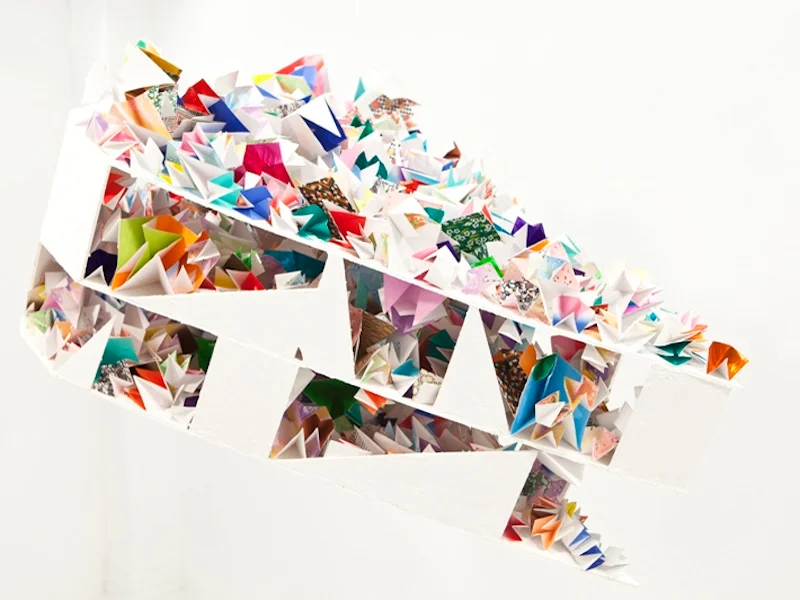 Hanging Cake, 2012, origami paper, foam board, acrylic, 18 x 40 x 30 inches, Installation view at School of Visual Arts MFA Fine Arts Spring Open Studio, New York, 2012