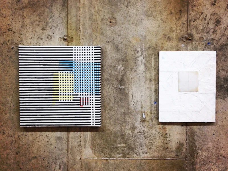 Left: No.860042514 , 2014, pencil, acrylic, oil and tape on canvas 16 x 16 inches Right: Cube VII , 2012, mix media on panel, 14 x 11 inches Installation view at Group Velocity, Interstate Projects, Brooklyn, New York, 2014