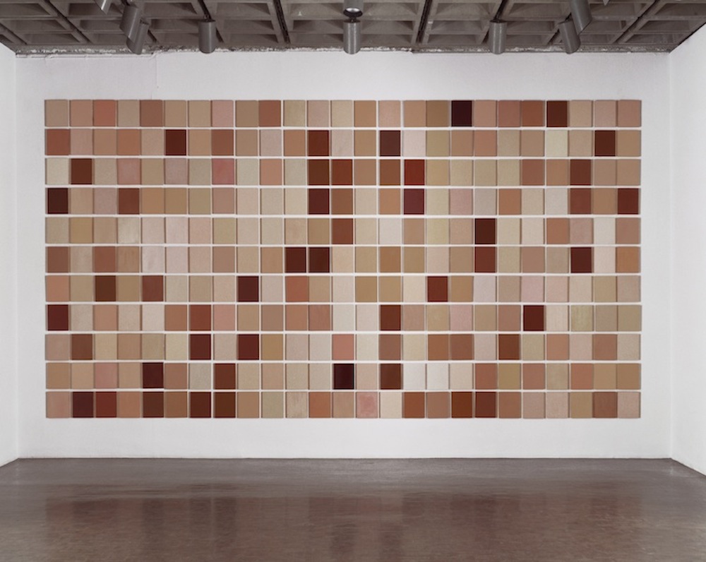 Installation view of Byron Kim, Synecdoche ,1991–present, oil and wax on wood, each panel: 10 x 8 inches, overall installed: 120 1/4 x 350 1/4 inches, Whitney Museum of American Art, NY. 