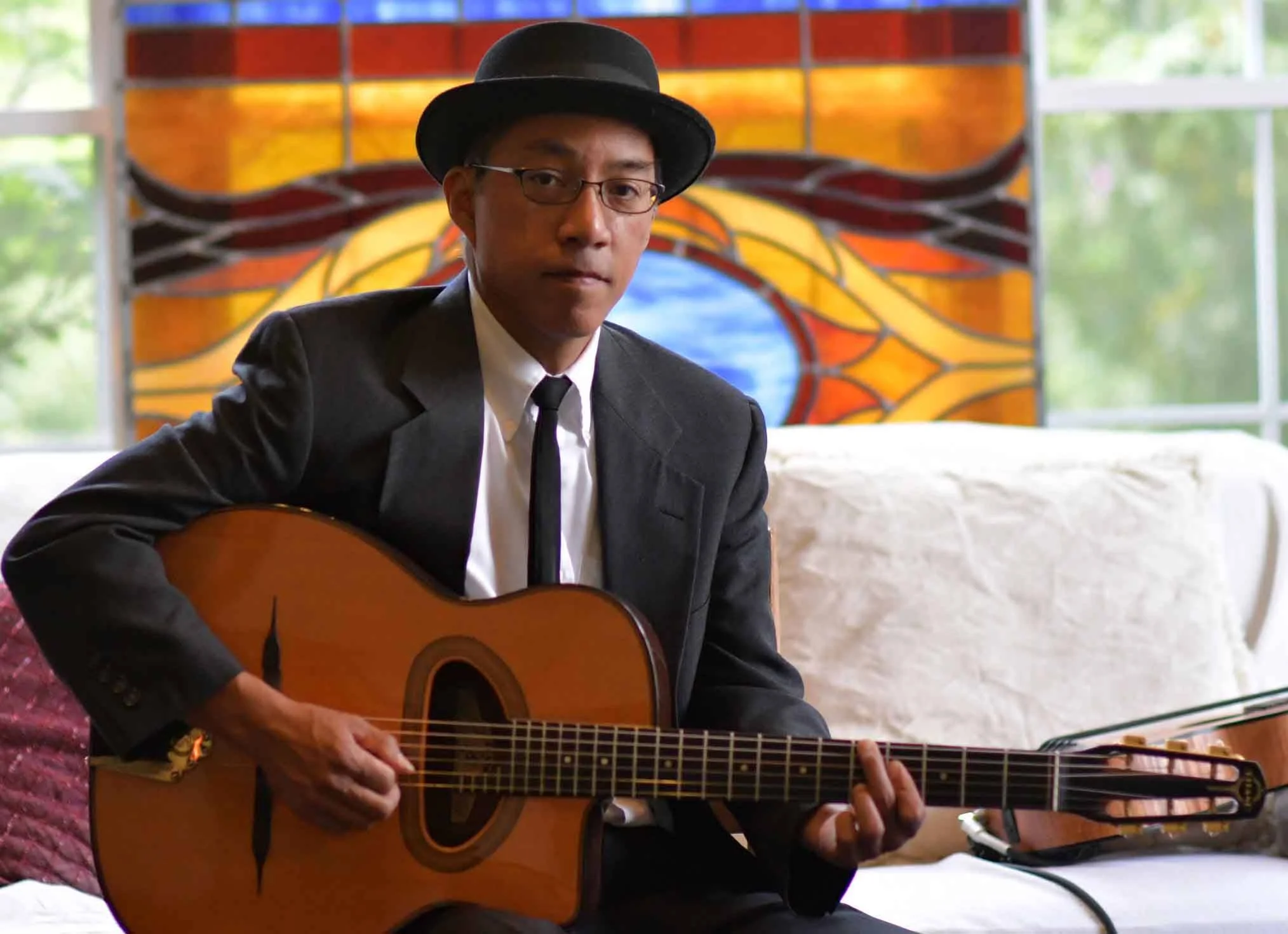 This guy is versatile! Mario Joven plans in Dukes of Django and numerous other bands.