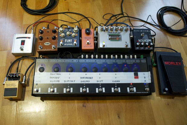 Joff Winks guitar rig - Pedaltrain One with light flight case. Korg DT10, Boss Acoustic Simulator, Carl Martin Combinator, Trex Replica, Strymon Flint, MXR Phase 90, Blackstar HT Dual, Tech 21 Comptortion, Morley Wah, photograph by Joff Winks ©2016