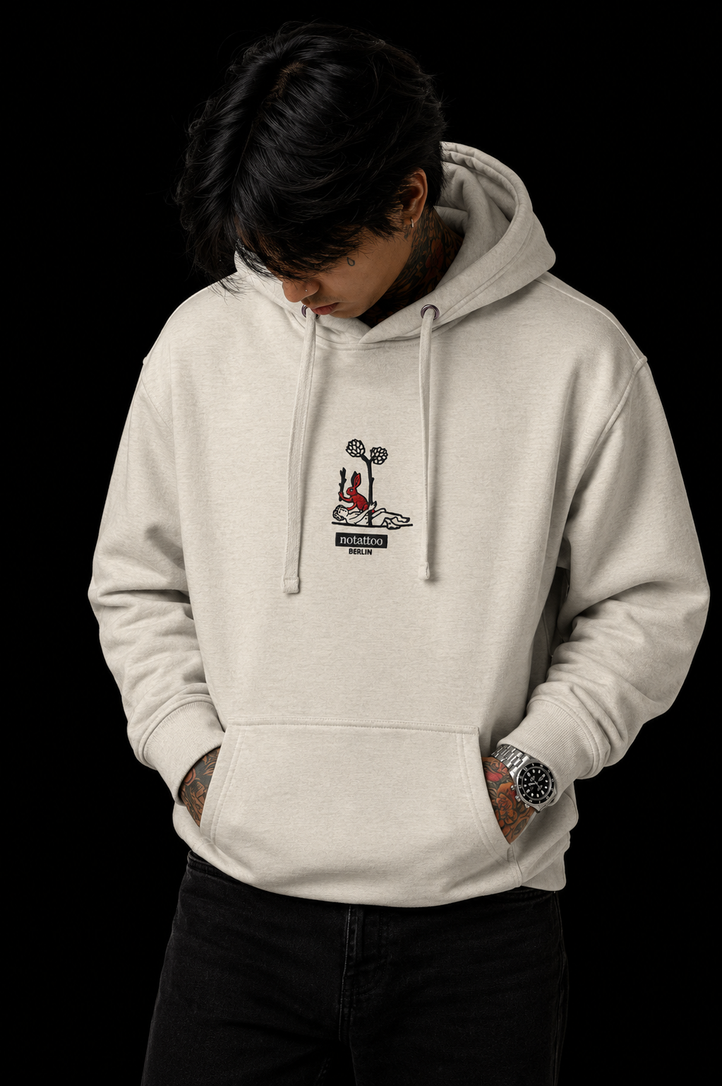 Front studio portrait of Basic Grey Medieval Killer Rabbit Hoodie by noSHBerlin, with embroidered rabbit artwork placed at the center of the chest.
