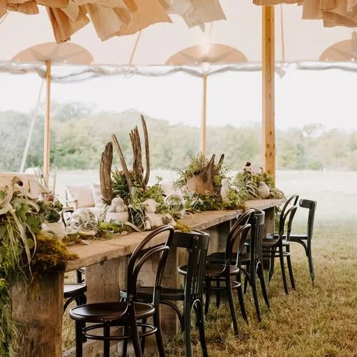 Rustic rental tables and decor for upscale Los Angeles glamping event