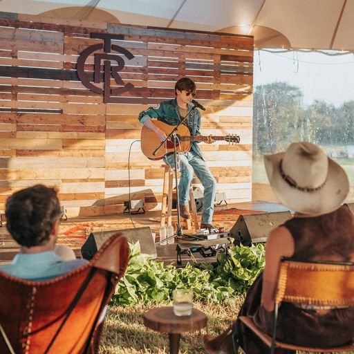 Live acoustic performance at Los Angeles glamping event for guest entertainment