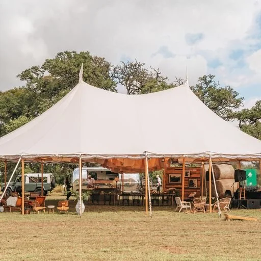Large sailcloth tent lounge setup for weddings and corporate glamping events in Los Angeles — available nationwide