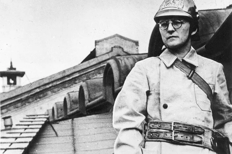 Shostakovich dressed and posed on a roof as a firefighter for after bombing raids, although he never served in the war