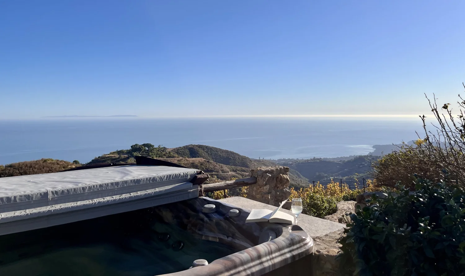 Cornell Wine Co. storefront with rustic signage and Malibu vineyard backdrop
