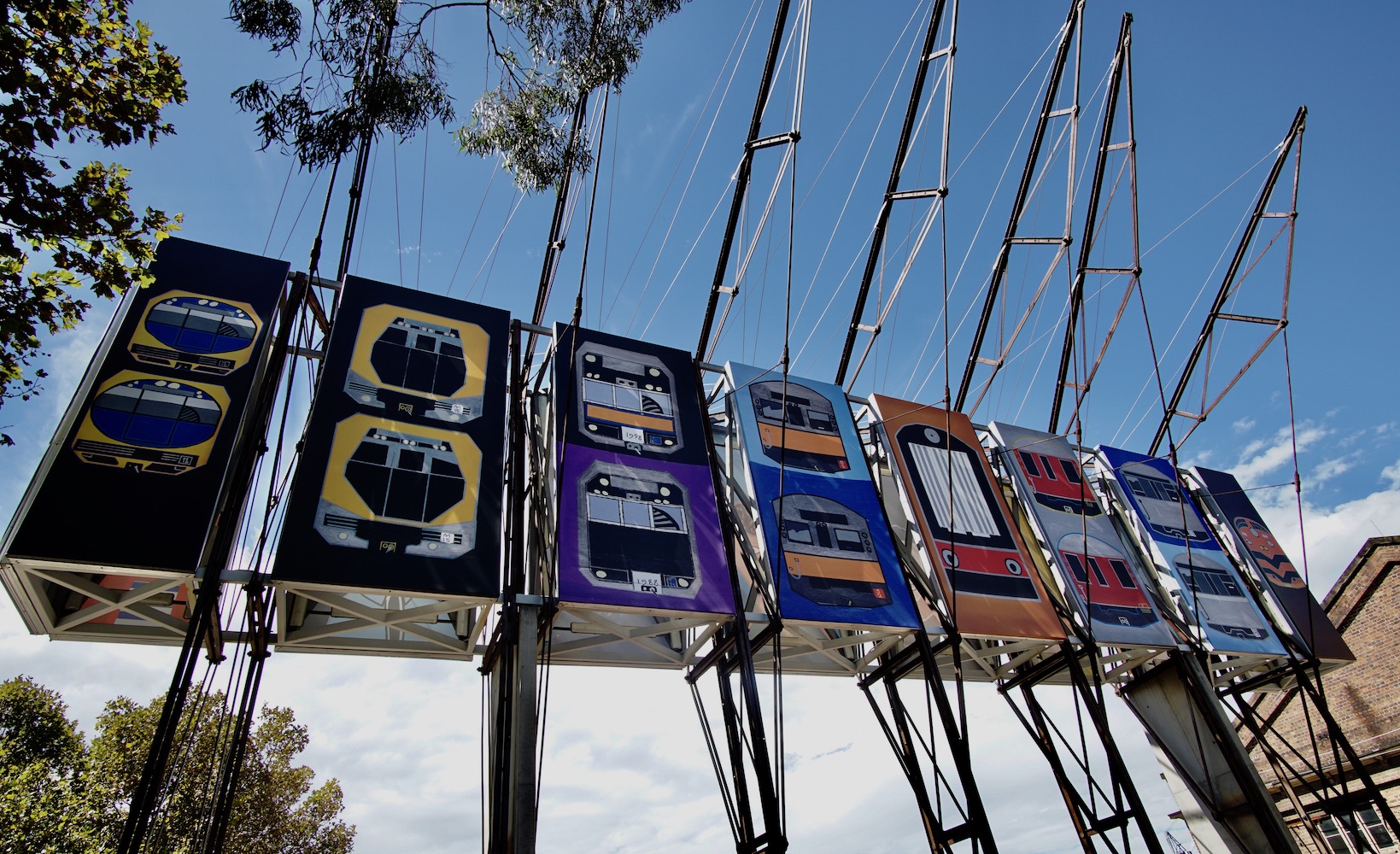 Thom Roberts Counts Trains - The National: New Australian Art, Carriageworks, March 2019, 18 resin coated polyester fabric banners