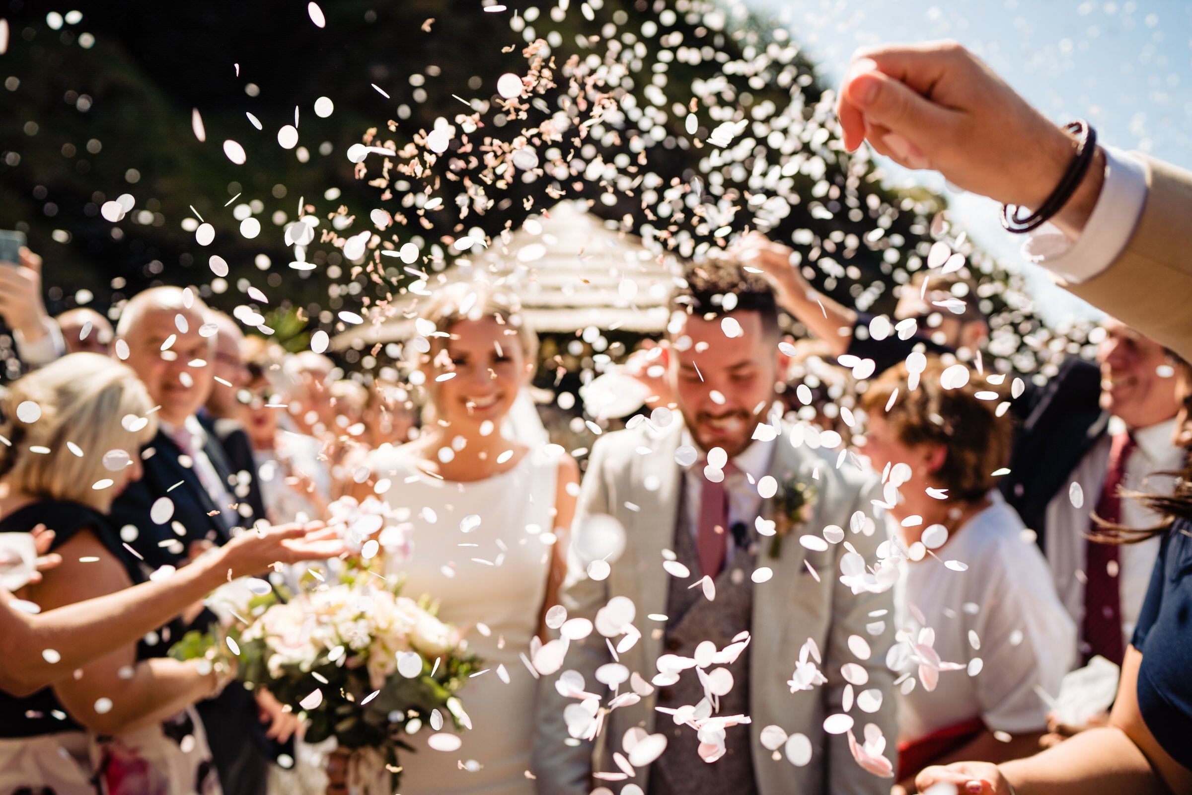 confetti - tunnels beaches - wedding - bride - groom - devon.jpg