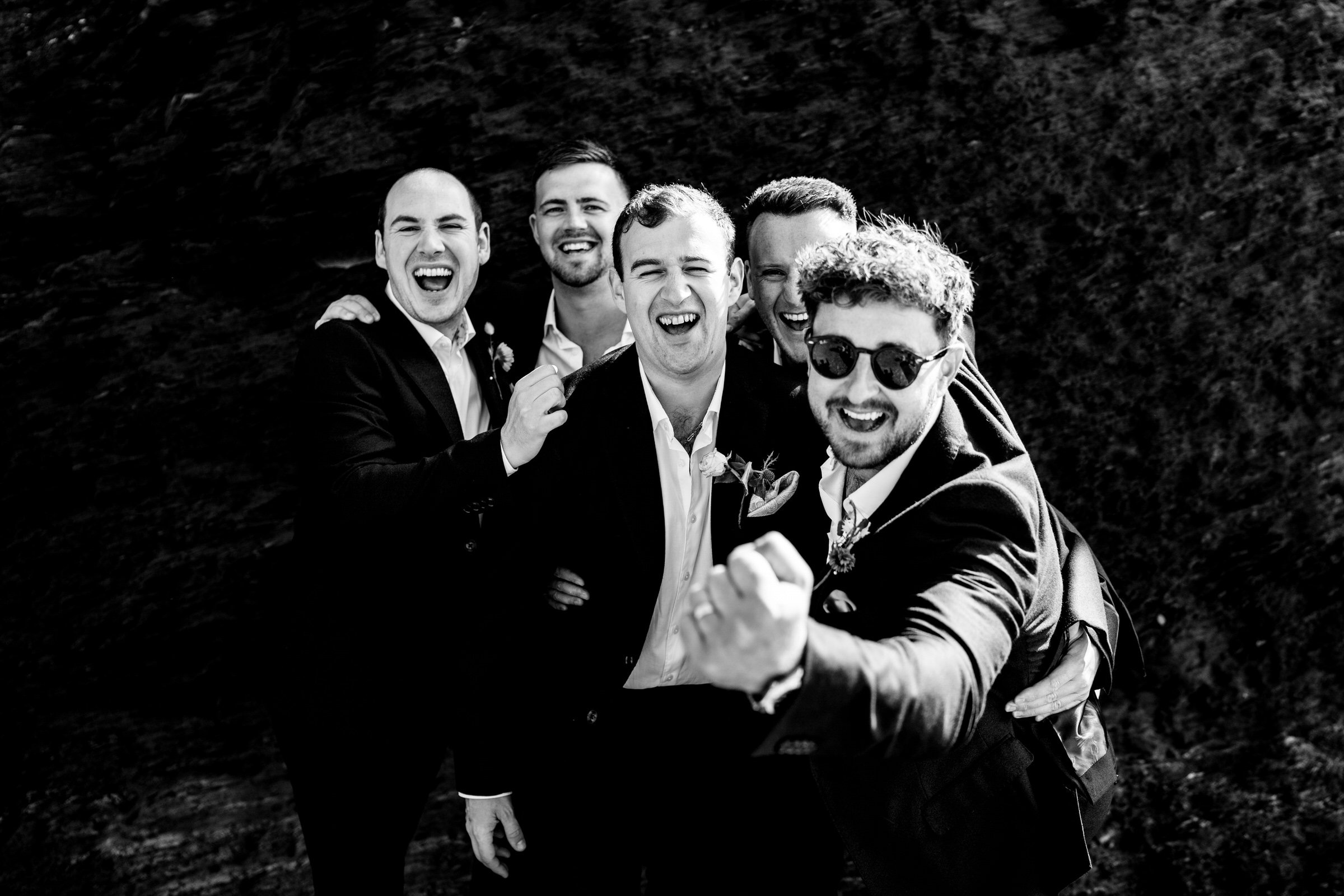 groomsmen - laughing - black and white - tunnels beaches.jpg