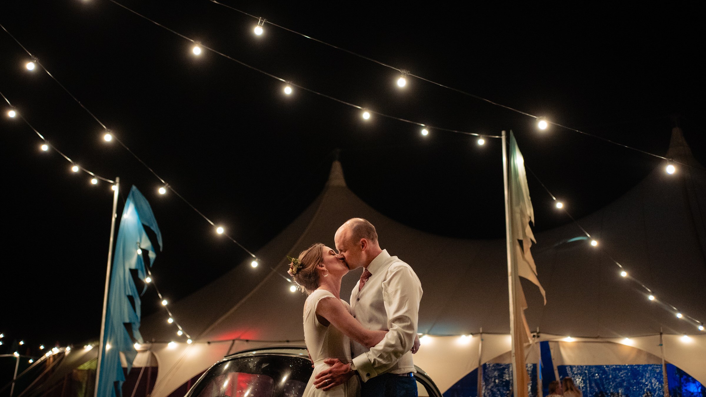 bride and groom - marquee - kiss - devon.jpg