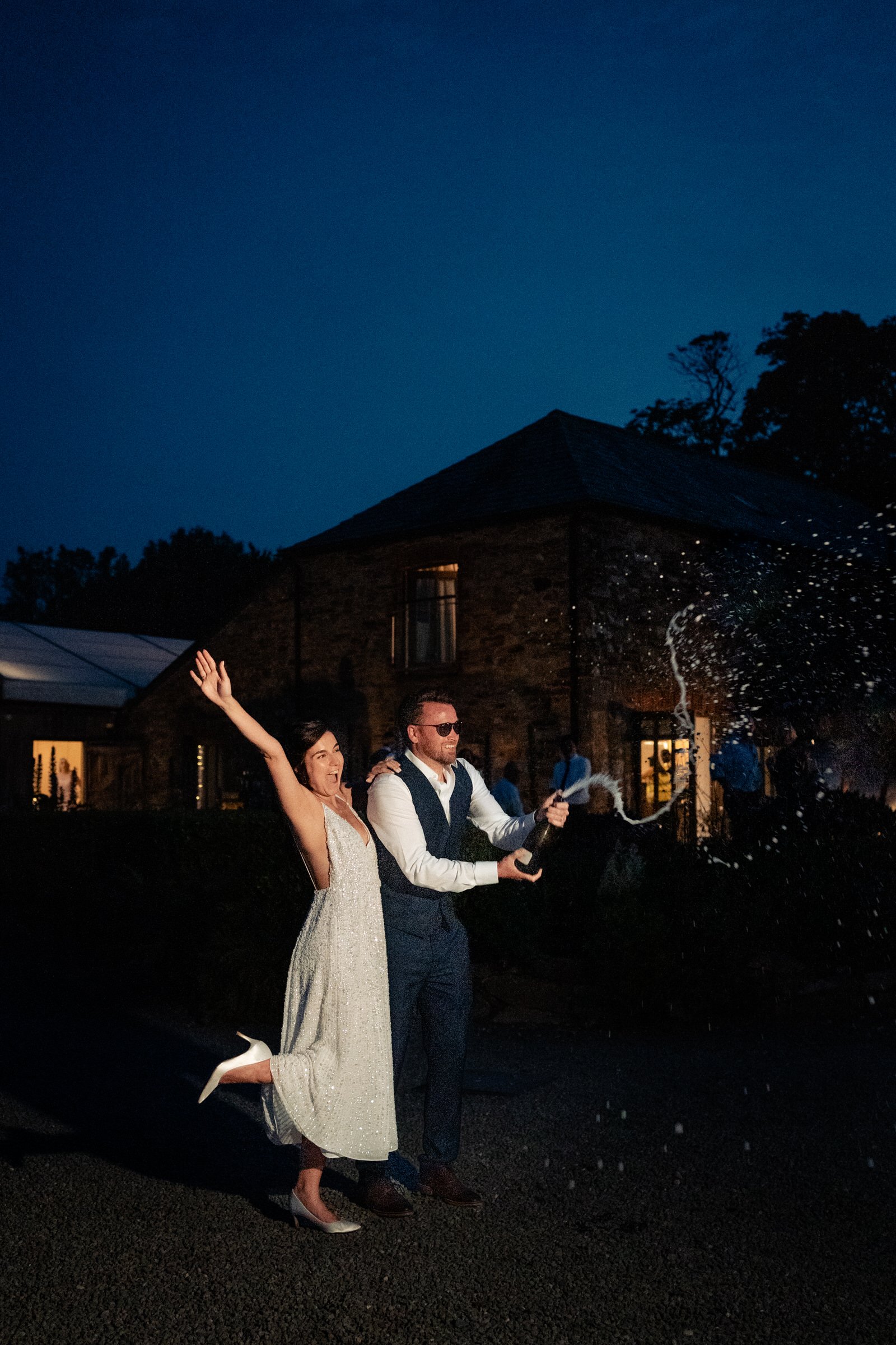 champagne - bride - groom - trevenna barns - cornwall.jpg