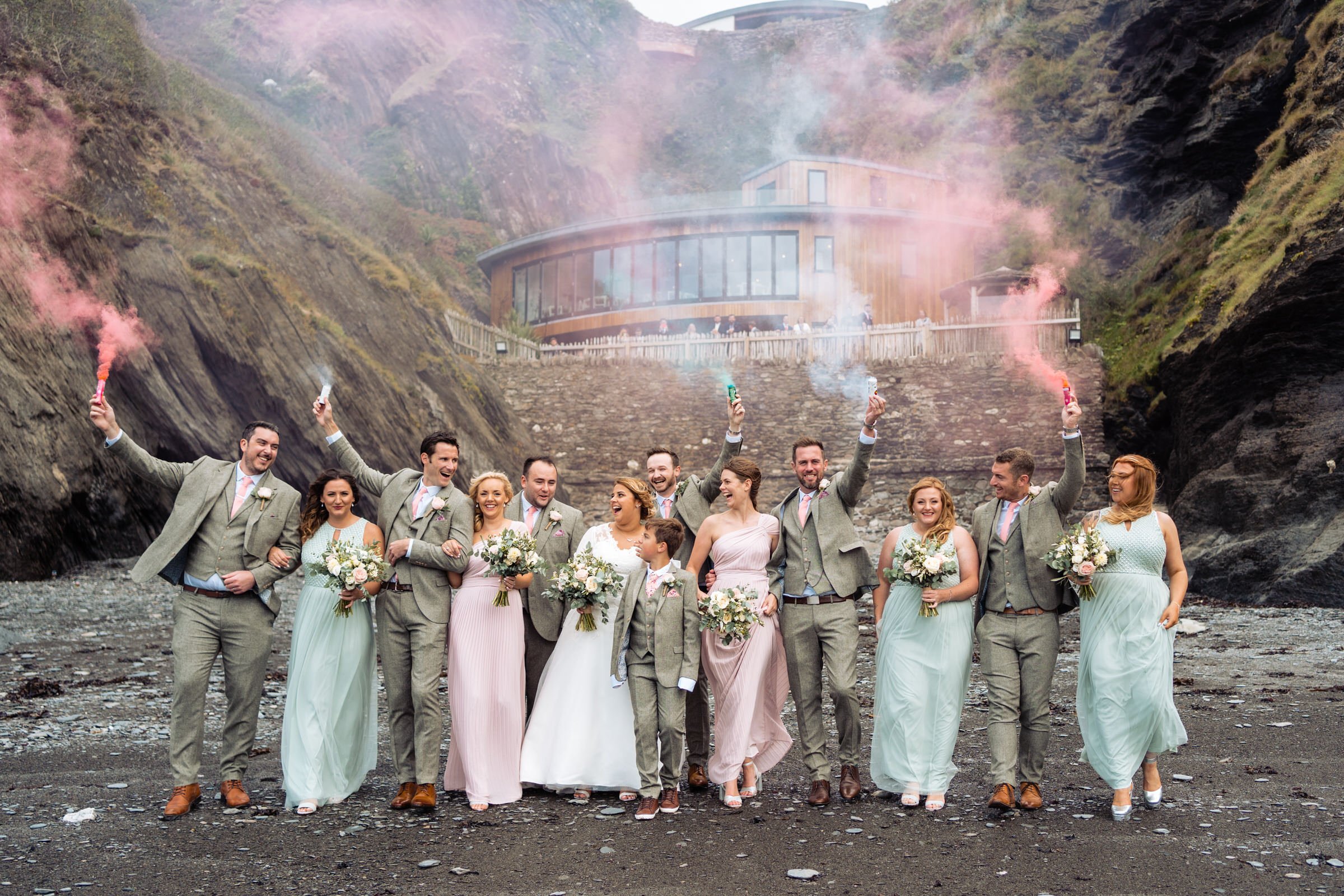 bridal party - smoke bombs - beach - tunnels beaches.jpg