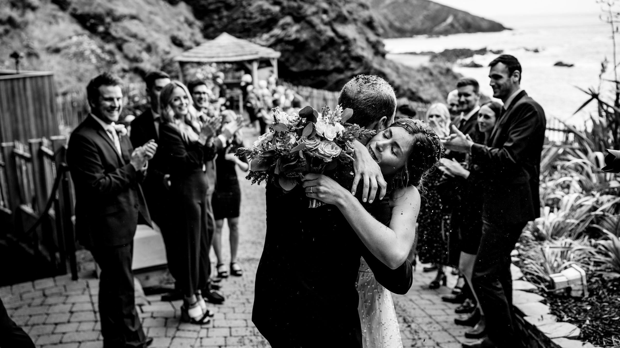 hug - bride- groom - tunnels beaches - wedding - devon.jpg