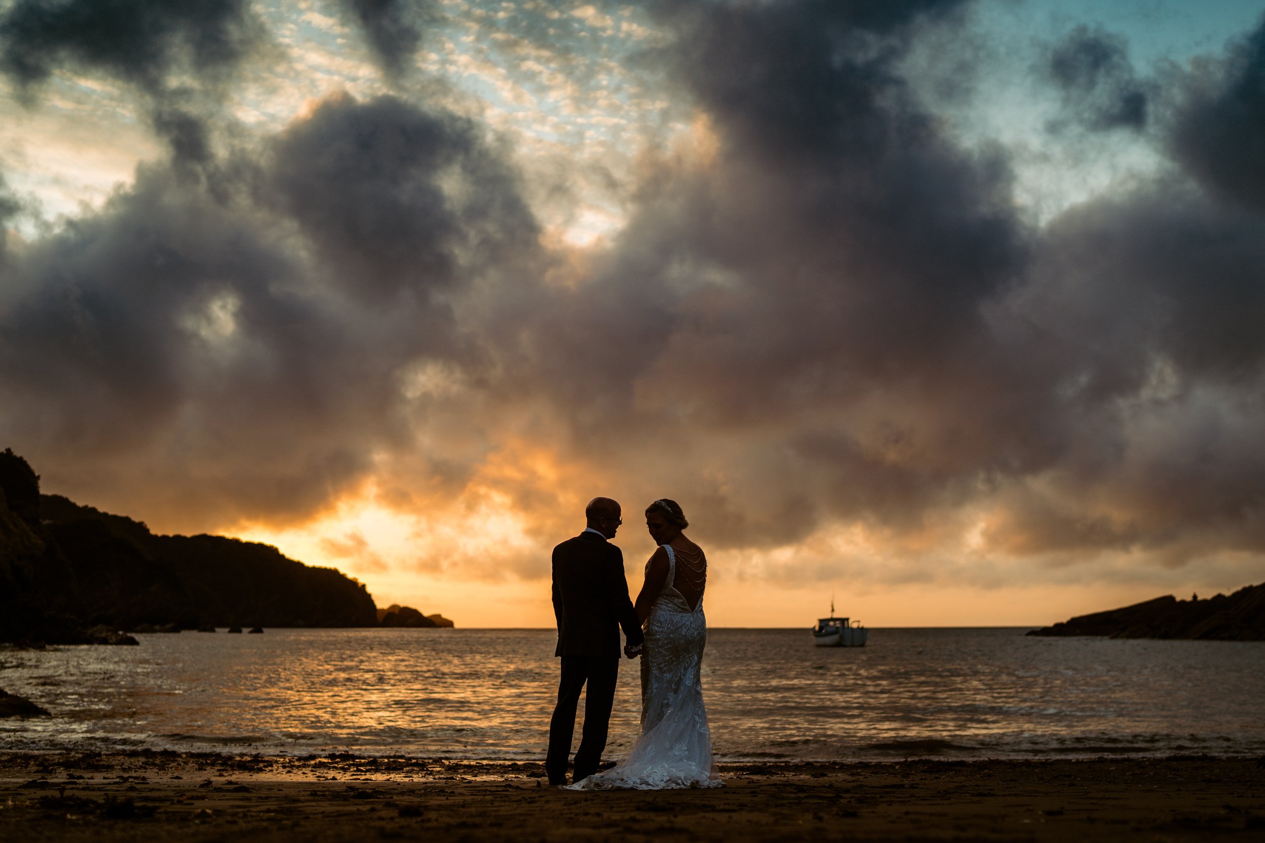 sunset wedding couple on coombe martin beach devon