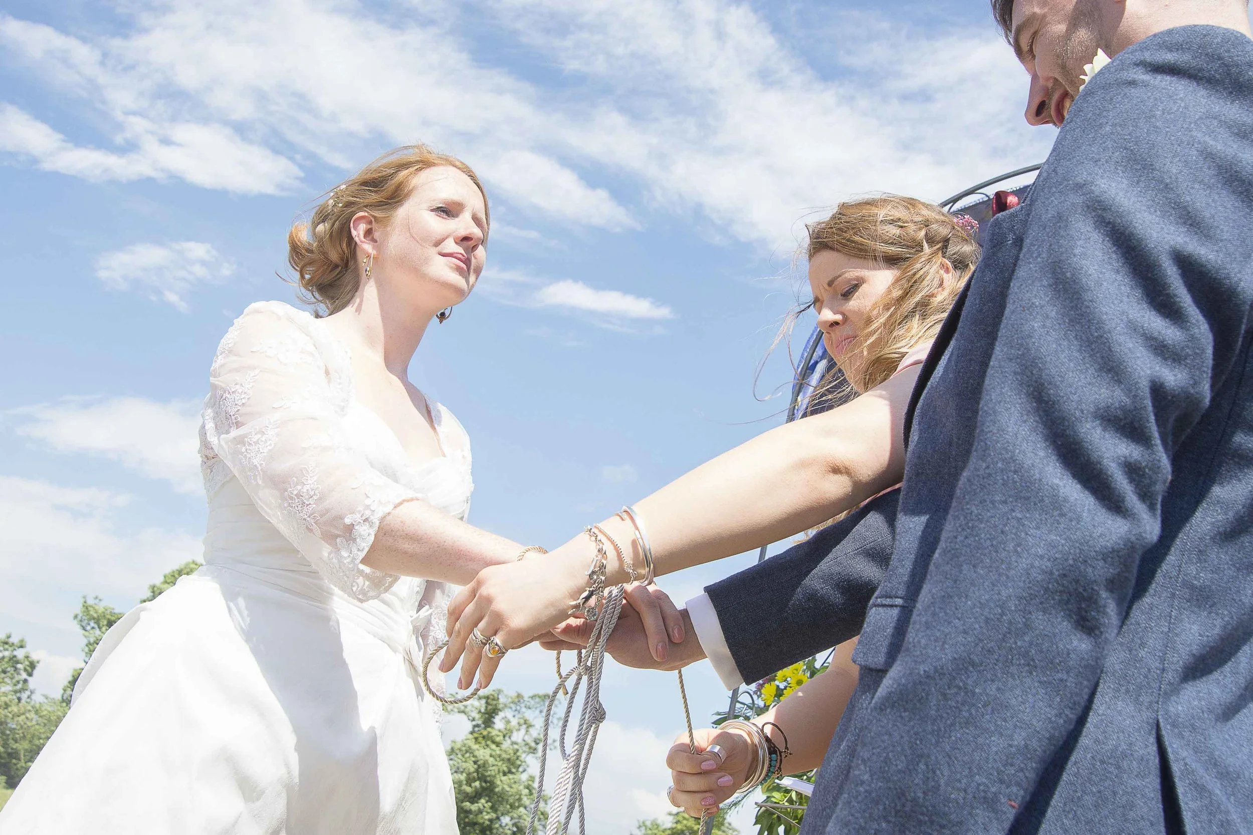 Bride against blue sky