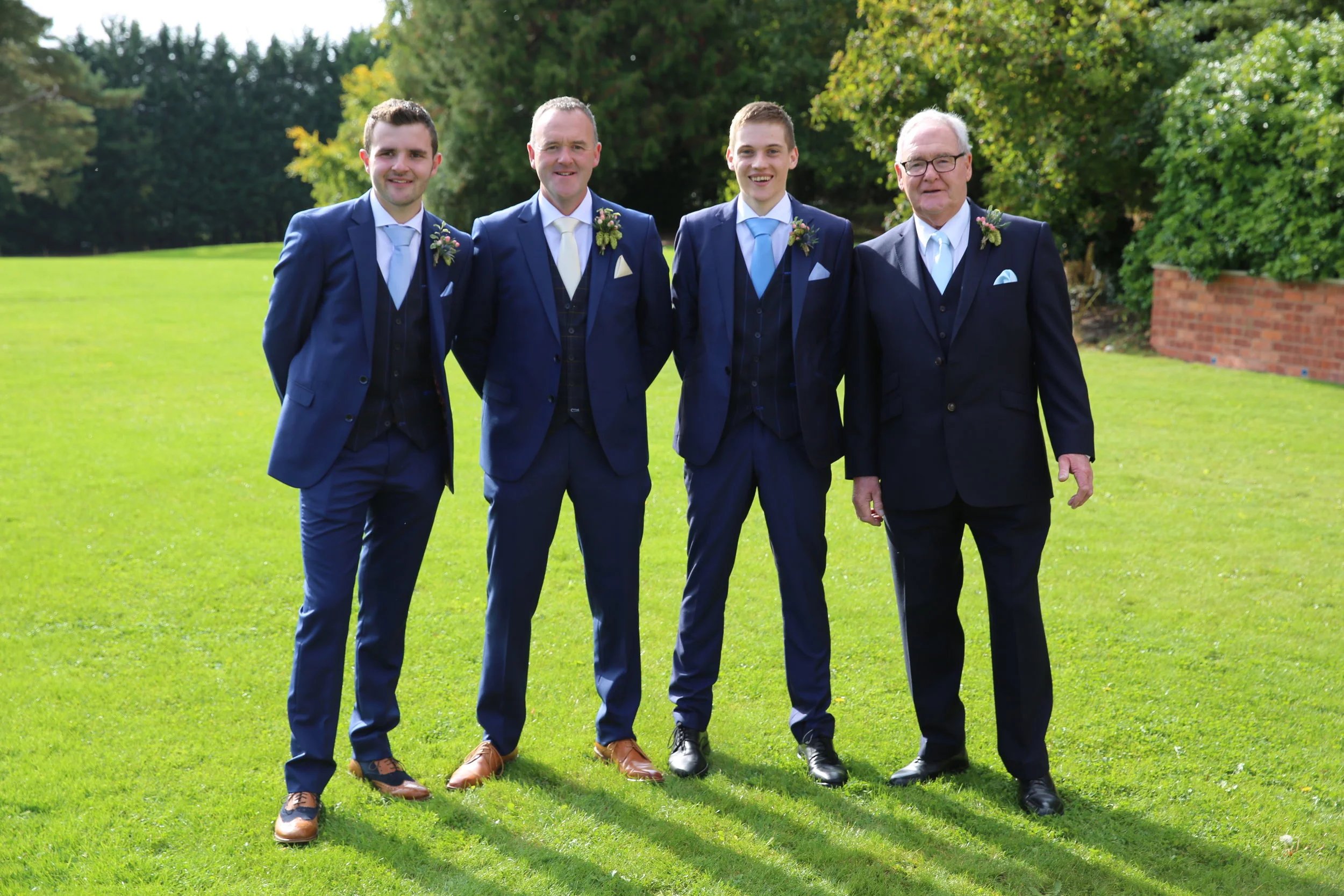 Grooms party in Symonds of Hereford wedding suits