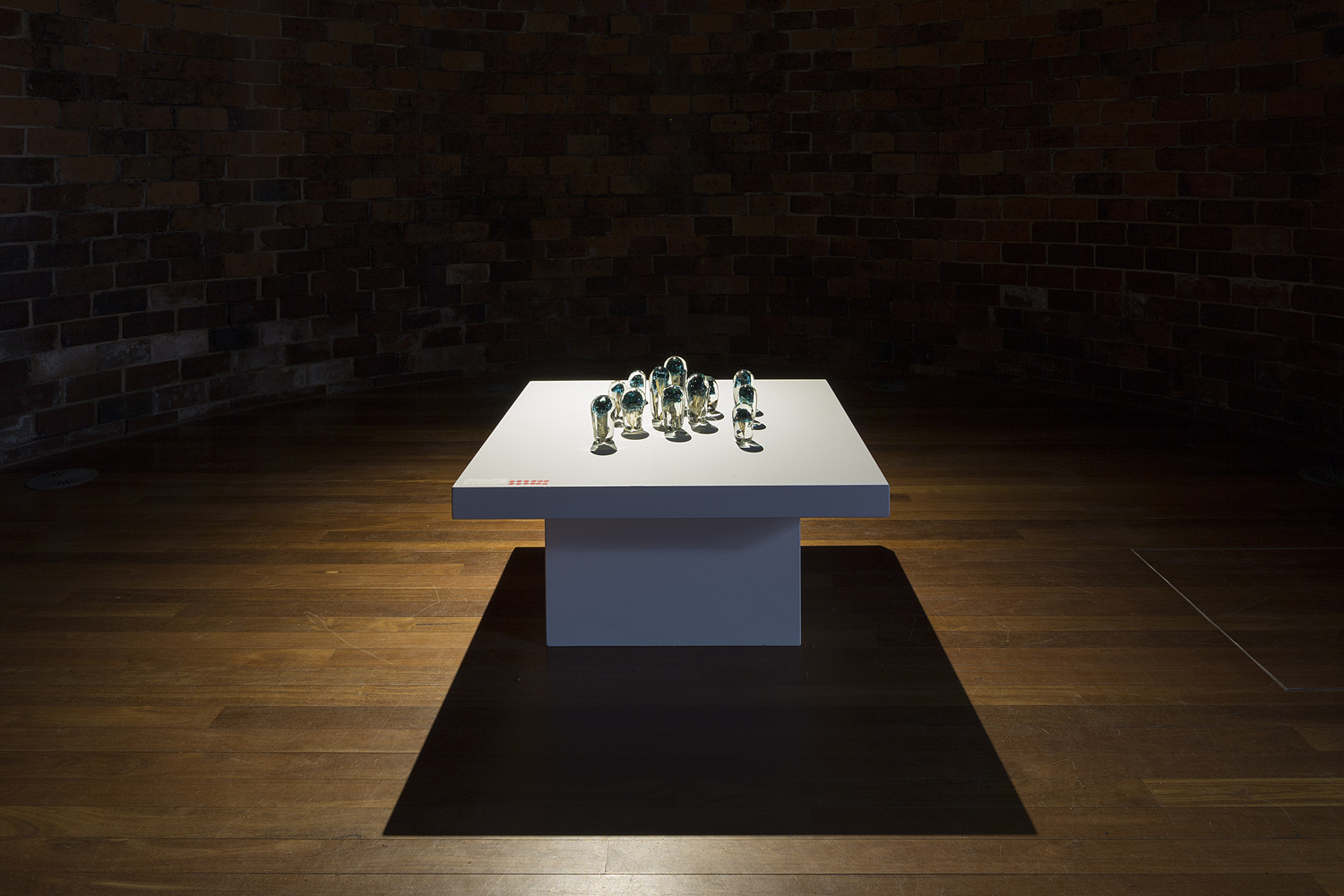 Collaboration with Emilie Patteson, Mushrooms, hot-sculpted glass with mushroom and copper inclusions, 2014, (photo by Adam McGrath), Canberra Glassworks GLINT exhibition install