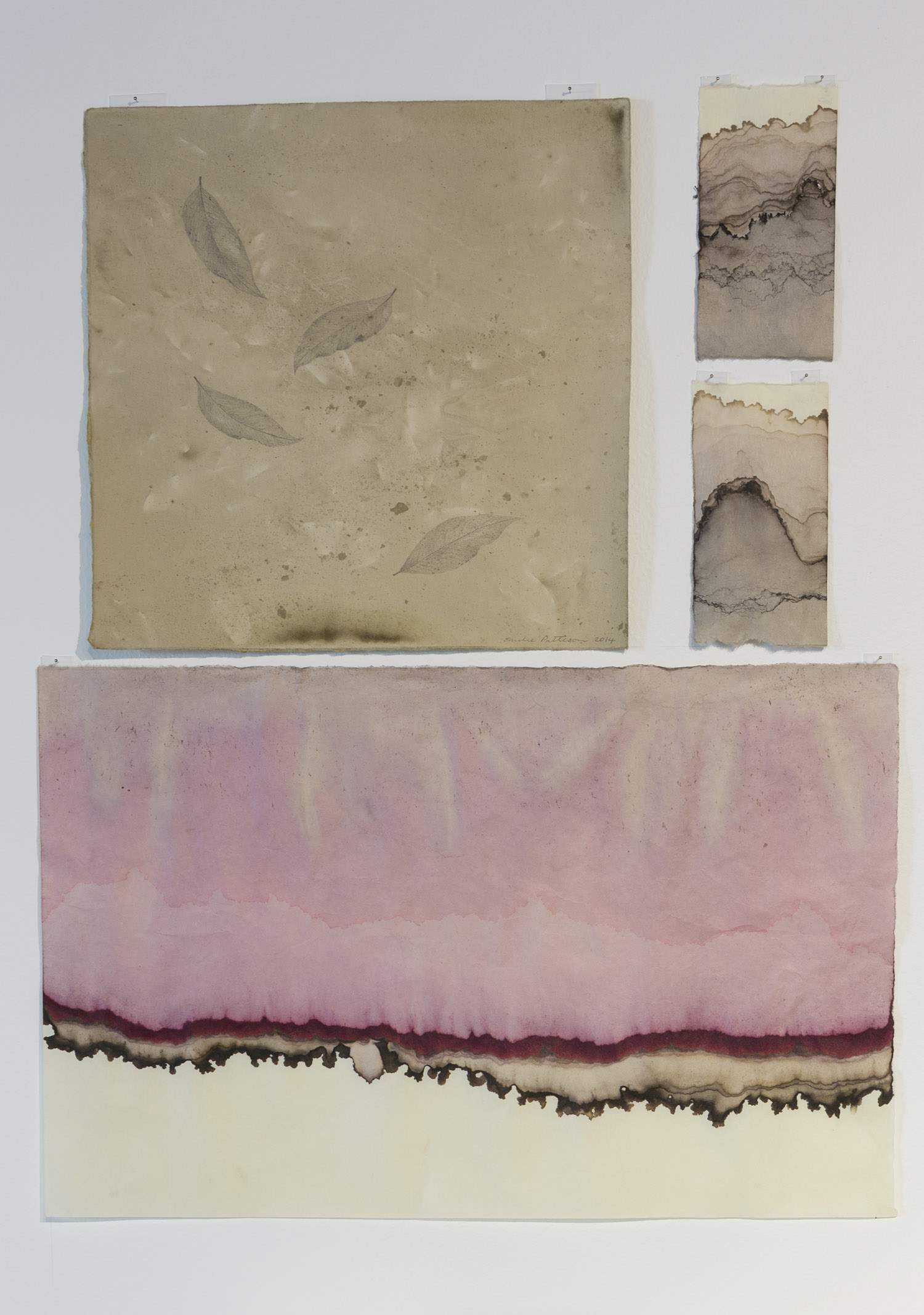 Infusion by Emilie Patteson (top left) with Topography by Annika Romeyn (right and bottom), natural dyes on paper, 2014, (photo by Adam McGrath), Canberra Glassworks GLINT exhibition install