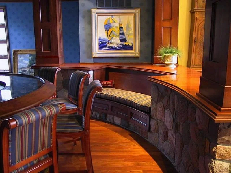 Curved cherry bar & seating area.