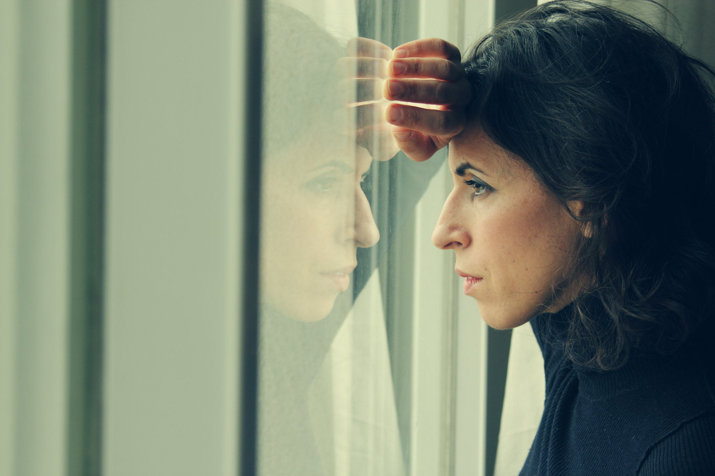 woman looking out.jpeg