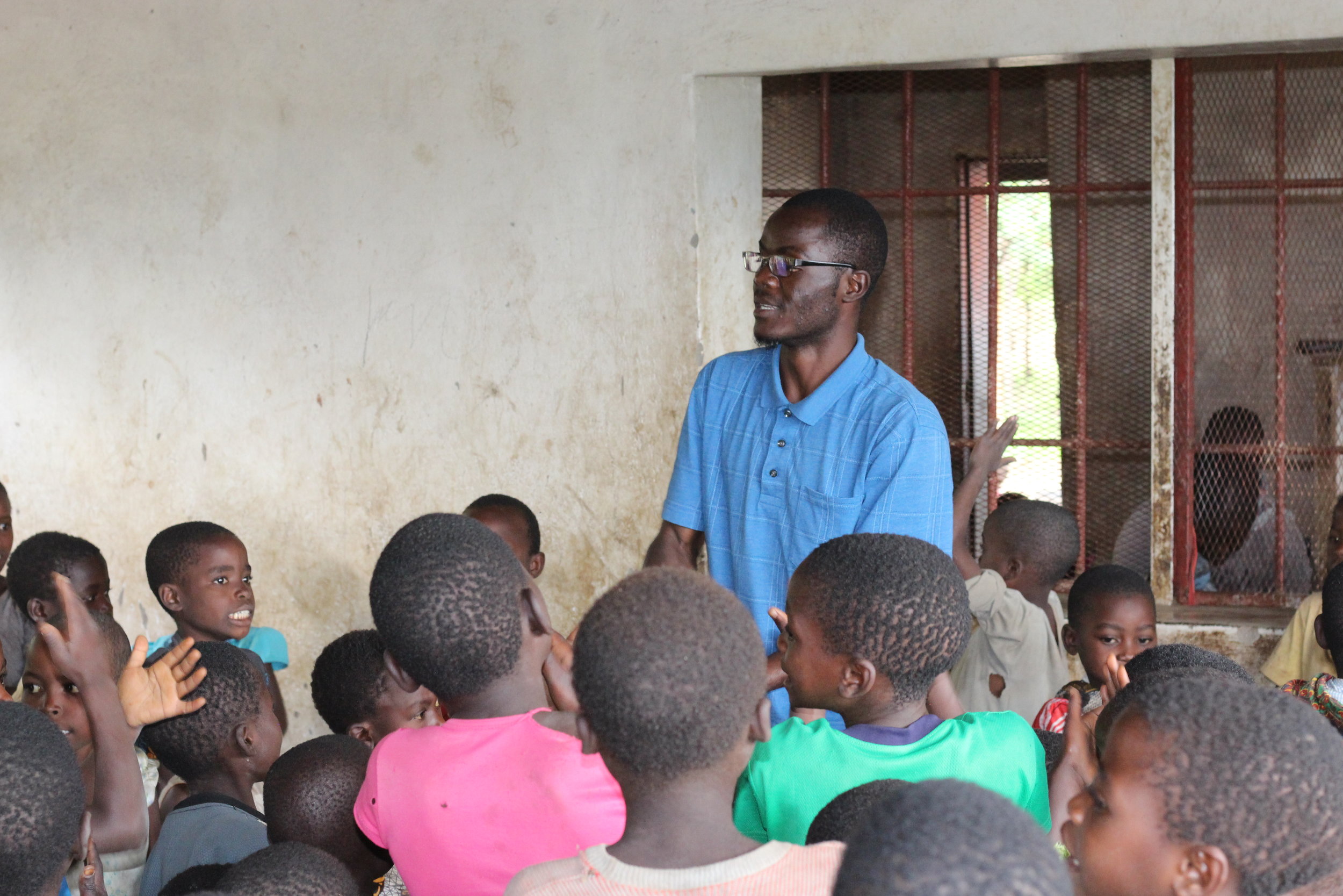 One of our African Bible College students, George, leading the kids' program.