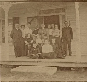 family photograph on the "Victorian" porch