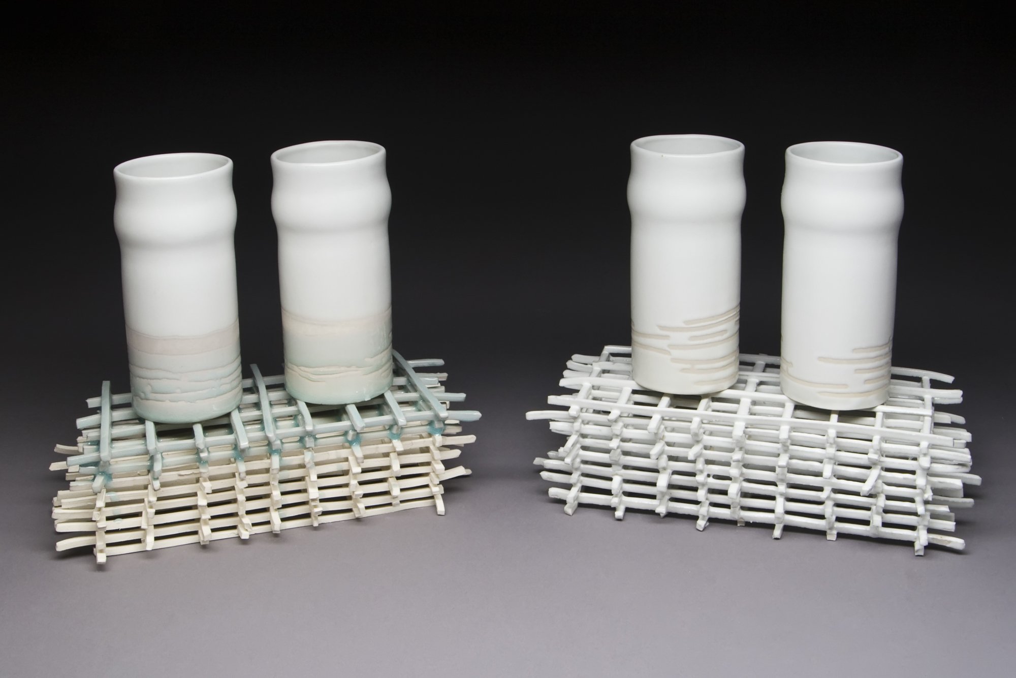  Cup Sets on Stick Structure Porcelain, Glaze 10" x 9" x 4.5" each 2010 Photo Credit: Jim Walker &nbsp; 