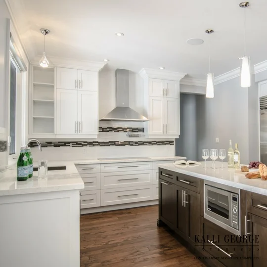 Toronto design build home with white kitchen - walnut stain island - subway tile and mosaic backsplash.jpeg