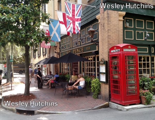 The Union Jack of the United Kingdom at the Six Pence Pub in my hometown of Savannah, GA, with the Home Nation flags of England, Scotland, and Wales and the flag of the United States. Image Credit: Wesley Hutchins