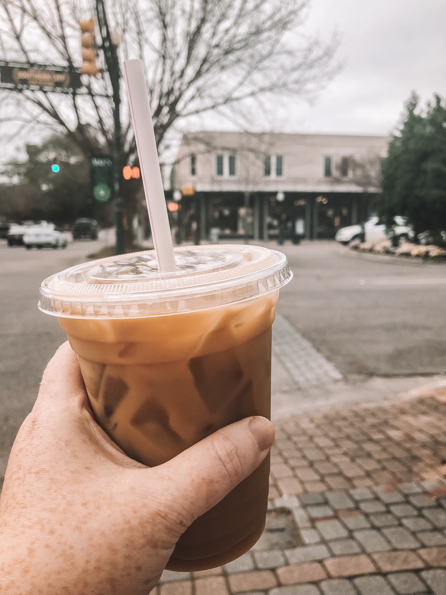 Taking a few minutes to myself to enjoy a coffee from New Moon Café in downtown Aiken.