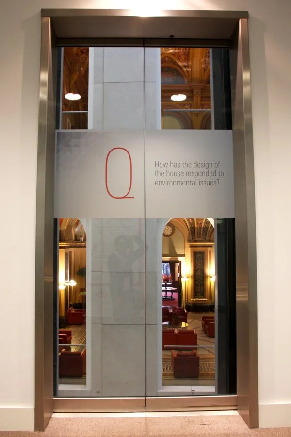 Clear lift doors with a question from the 2011 RIBA - HSBC Private Bank campaign.